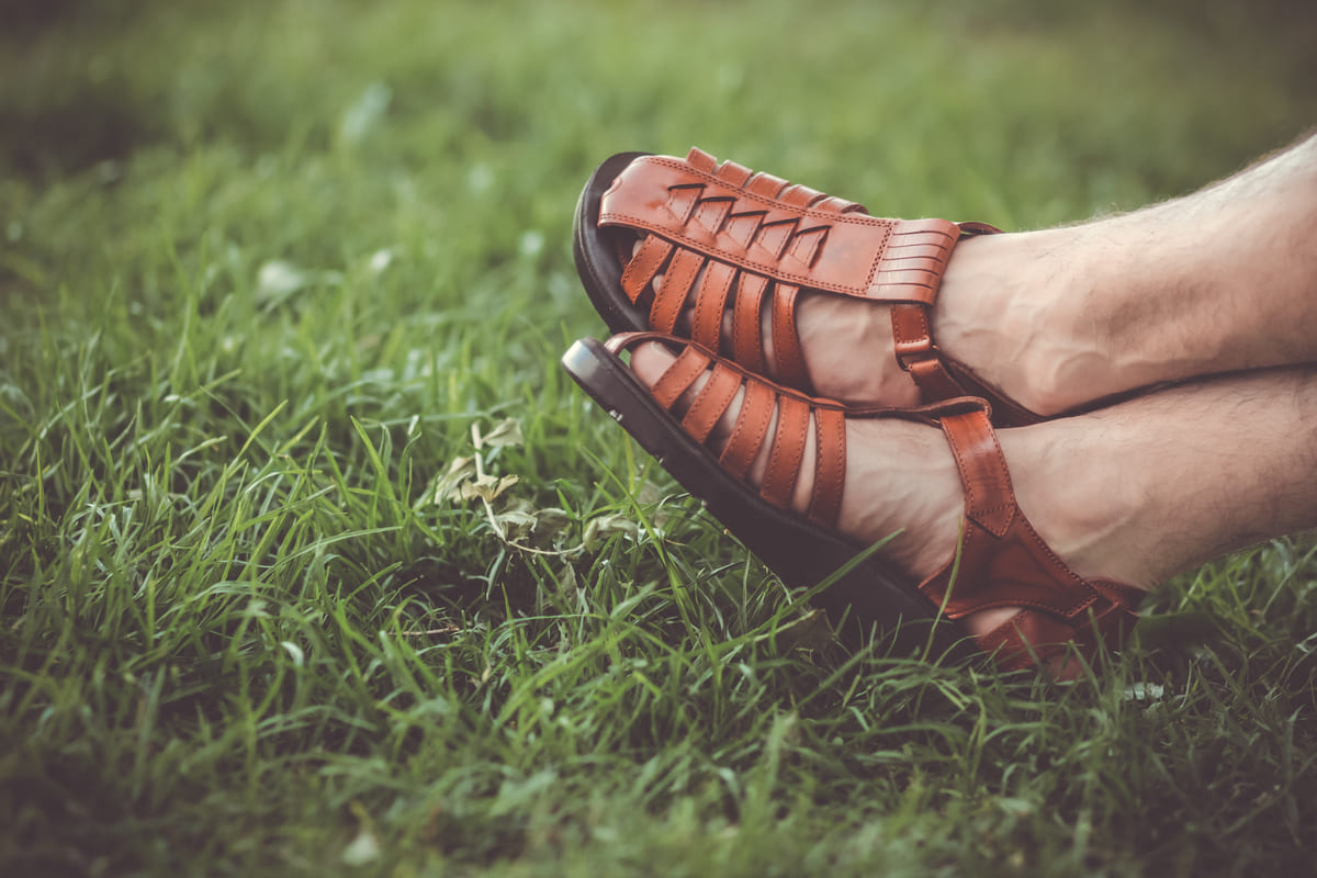 feet grass sandals leather