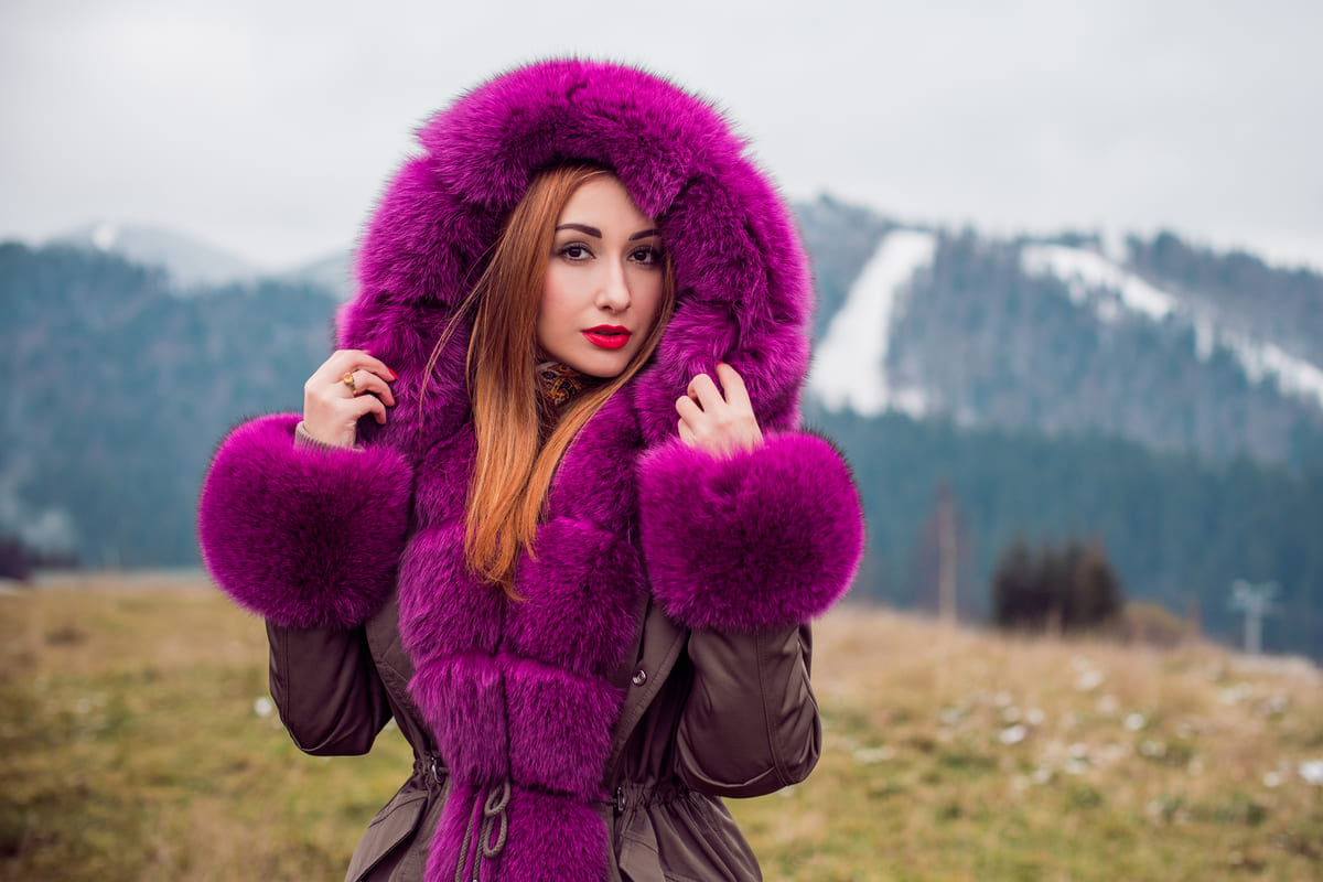 woman fur jacket purple parka