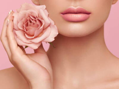 Viso labbra donna pelle perfetta rosa