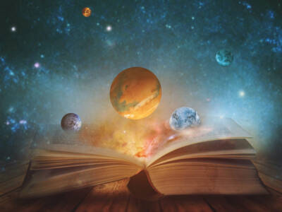 libro aperto universo pianeti galassia