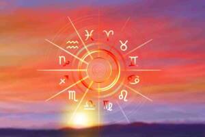 Ruota zodiacale con i dodici segni dell’oroscopo che risplendono alla luce del sole su uno sfondo di cielo dorato al tramonto